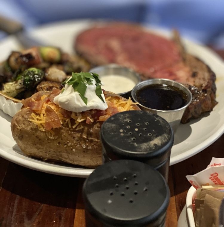 The Grill at 84 West steak with lake view